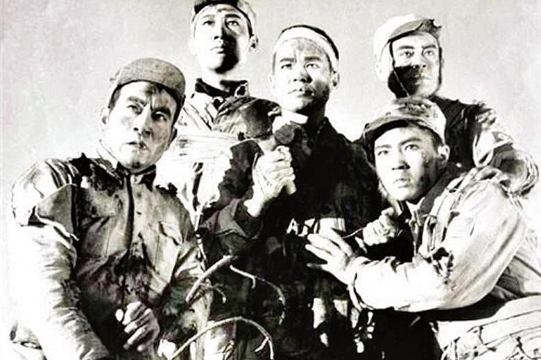 The poster for a 1958 movie about five Communist Party soldiers who refused to surrender to Japanese troops. A historian who questioned whether the men were as heroic as the state has said was ordered to publish an apology last year. The draft provis