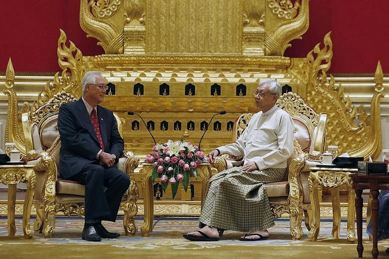 Emeritus Senior Minister Goh Chok Tong calling on Myanmar President Htin Kyaw at the Presidential Palace in Naypyitaw yesterday.