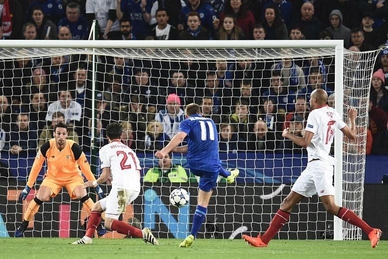 Midfielder Marc Albrighton scoring Leicester City's second goal during their Champions League round of 16 second leg match against Sevilla at the King Power Stadium.