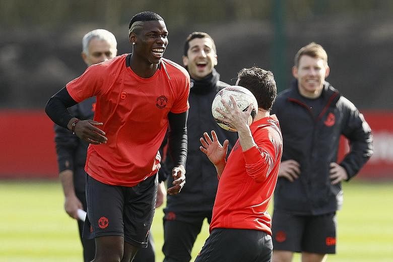 Paul Pogba enjoying a light moment at training yesterday. Manchester United take on Rostov at Old Trafford in a Europa League second leg clash today and Jose Mourinho has said the world's most expensive player is unaffected by criticism of his perfor