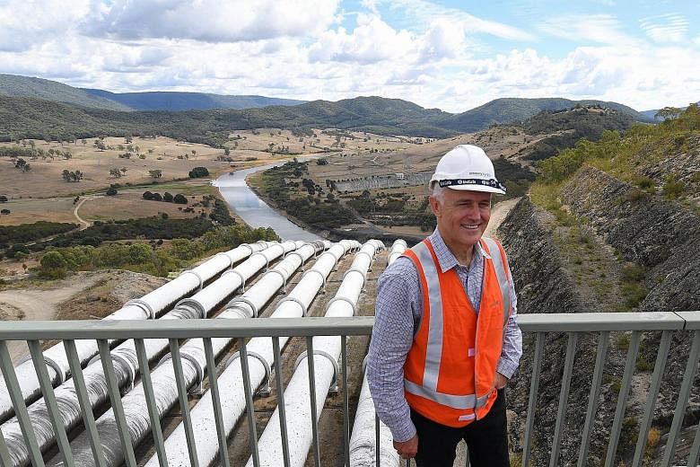 Australian PM Malcolm Turnbull at the Tumut 3 power station at the Snowy Hydro project in Talbingo, New South Wales, yesterday. The project, involving new tunnels and power stations, would boost the capacity of the 4,100MW hydroelectric plant by 50 p