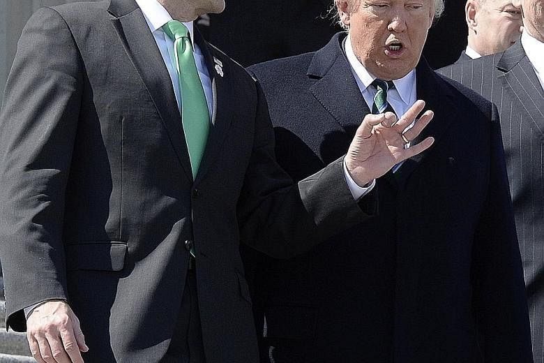 House Speaker Ryan, seen here with Mr Trump after attending an event in Washington on Thursday, said that "we have not seen any evidence that there was a wiretap".