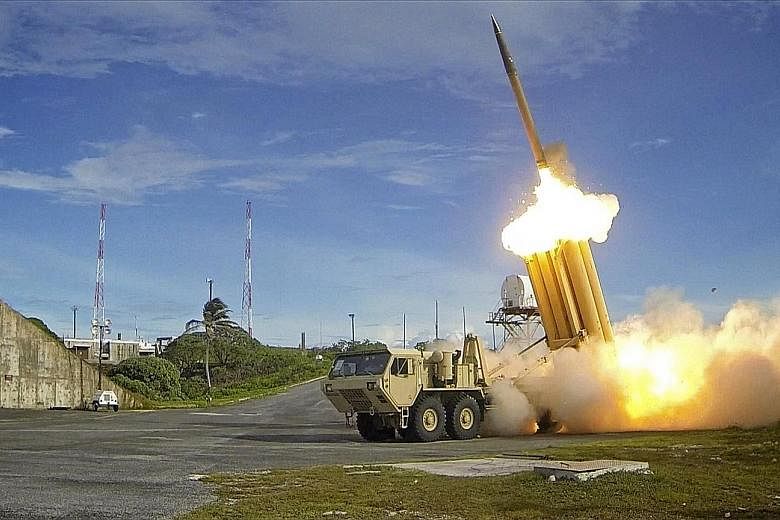 A handout photo made available by the US Department of Defence showing the launch of a Thaad interceptor in the US in 2013. China is opposed to the deployment of Thaad in South Korea as it believes the system's powerful radars can be used to spy on C