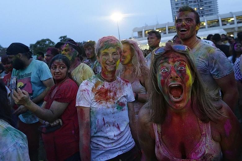 Their faces smeared with powder, revellers smiled for the camera as they celebrated Holi yesterday evening. About 6,500 descended upon the open field at Kampong Kembangan Community Club for the 12th Rang De Holi Festival. From 4pm onwards, they were 