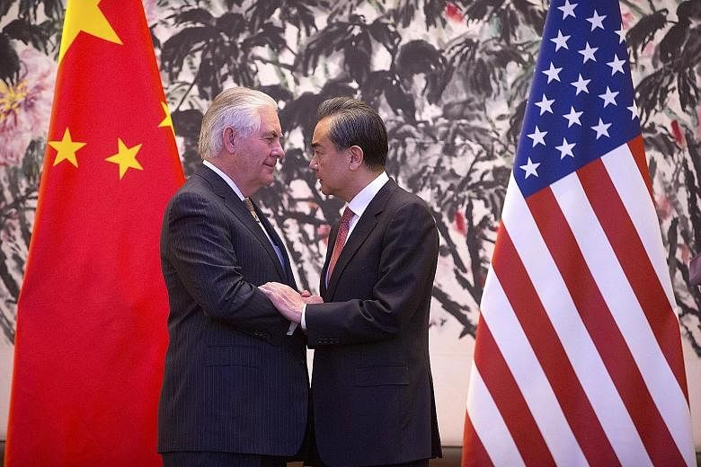 Mr Tillerson and Mr Wang after their joint press conference at Diaoyutai State Guesthouse in Beijing yesterday. Besides commenting on Pyongyang's nuclear programme, both men also discussed wide-ranging bilateral and regional issues, including maritim