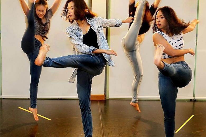 In Future Feed (above, in a rehearsal shot), the choreography of Angela Liong oscillates between gestures of eating and harvesting, and modern dance vocabulary of kicks, spins and dips.