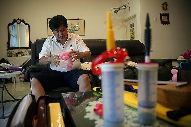 Retiree Sidney Ho, 59, trying to perfect a balloon dolphin at home. Also known as "Scooby", he is CCU's balloon master. Mr Ho taught himself various techniques of balloon sculpting from Internet videos, and uses the balloons as icebreakers when he me
