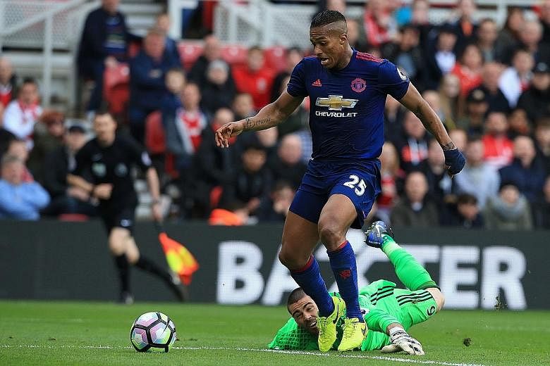 Manchester United's Ecuadorian right-back Antonio Valencia walking in their third goal after a mistake by Middlesbrough's Spanish goalkeeper Víctor Valdes during their English Premier League clash yesterday.