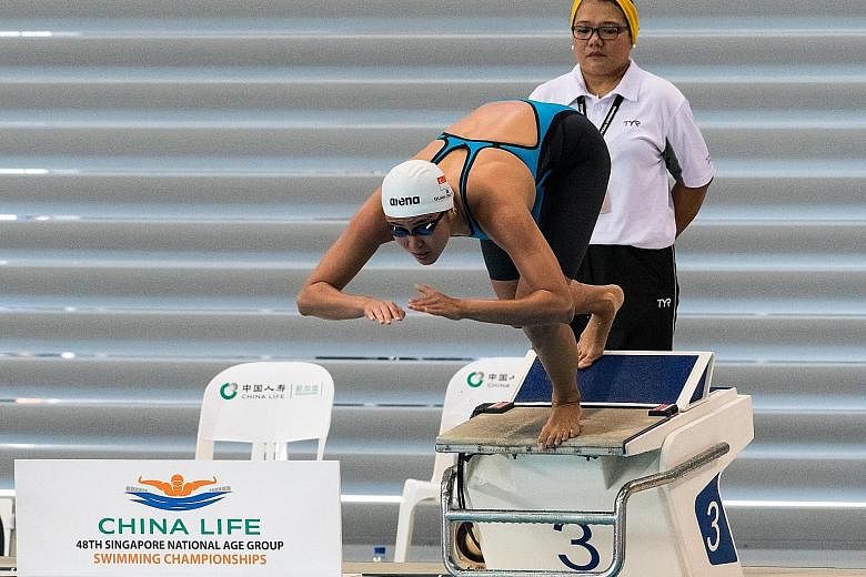 Quah Ting Wen exploding off the blocks on the way to winning the women's 50m freestyle final in a national record of 25.27sec, bettering Amanda Lim's eight-year-old mark.