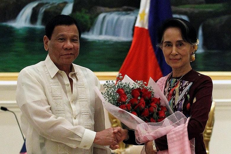 Mr Duterte meeting Myanmar State Counsellor Aung San Suu Kyi during his visit yesterday.