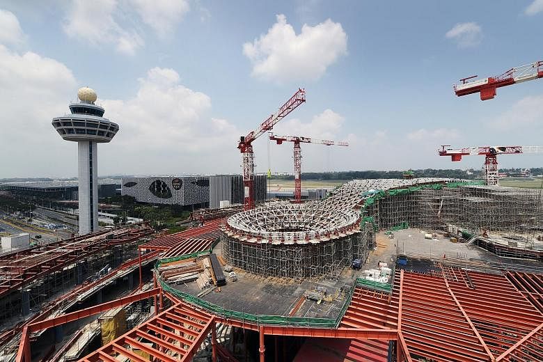 Jewel Changi Airport is shaping up nicely, with works in full swing behind the hoardings. A recent preview tour for The Straits Times showed much of the structural work at the site in front of Terminal 1 - where an open-air carpark used to be - has b