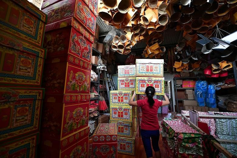 "Treasure chests" on sale at the Yeo Swee Huat Paper Agency in Toa Payoh. Such items are burnt as offerings to the dead during the Qing Ming period, but the resulting ash has left some people fuming.
