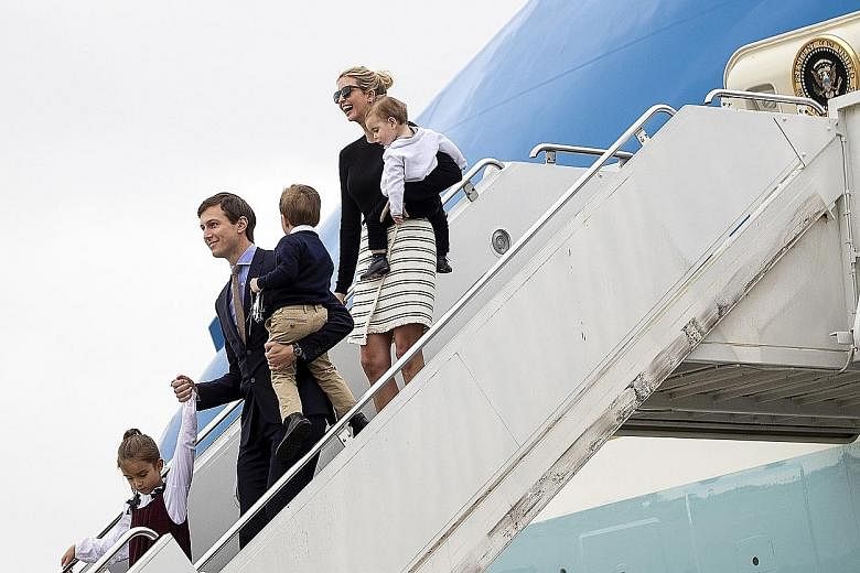 Ivanka Trump arriving with her husband Jared Kushner and their children in West Palm Beach. Her fine jewellery line was either shut down or transformed into Ivanka Trump Fashion Jewelry, which is sold at a lower price.