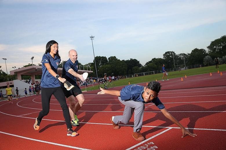 NorthLight School student Muhd Syahmil Samsudin (right) is one of the beneficiaries of the In My Shoes movement. Founded by national hurdler Dipna Lim-Prasad and James Walton, head of Deloitte South-east Asia's sports business service line, the movem
