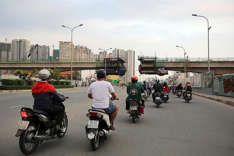 A bridge being built in Ho Chi Minh City in January. Vietnam's public- and private-sector infrastructure investment has averaged 5.7 per cent of gross domestic product in recent years, the highest in South-east Asia.