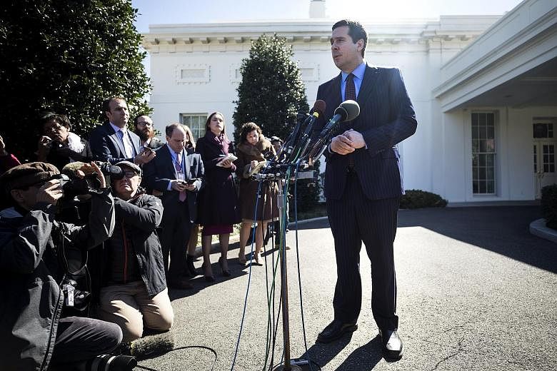 Mr Nunes speaking to the media outside the White House after meeting Mr Trump on Wednesday. He said it was possible that Mr Trump's communications, along with those of his transition team, were intercepted and disseminated among US intelligence agenc