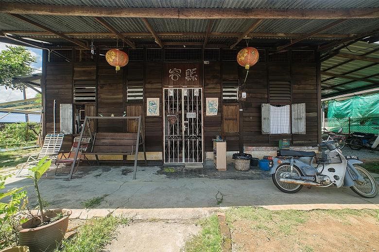Tourists enjoying the outdoors at Ikan Kurau Homestay (left). Ms Saloma, seen at top with her father and brother, started organising tours in Kampung Sadir, which became a hit, drawing visitors keen for a slice of village life, such as helping to pre