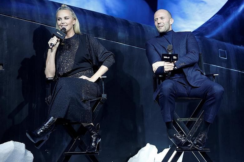 Charlize Theron and Jason Statham at a media event in Beijing for the new film, The Fate Of The Furious, which is also known as Fast & Furious 8 in Singapore.