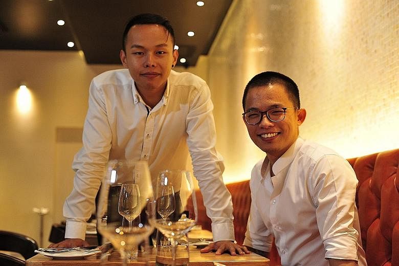 Saveur co-founder Joshua Khoo (left) now runs a hawker stall, while chef Dylan Ong is opening a casual restaurant next month.