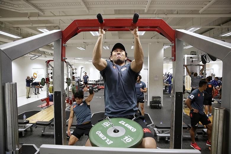 Centre Ryohei Yamanaka and his Sunwolves team-mates doing weight training in the Singapore Sports Institute gym on Monday. Their build-up to each match is jam-packed.