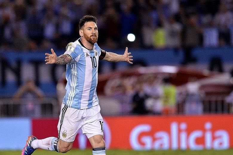 Lionel Messi celebrating his 16th-minute penalty against Chile. Argentina next play Bolivia in the World Cup qualifiers.