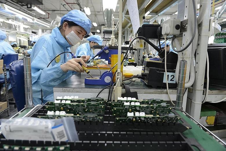 Electronics output last month swelled 39.8 per cent year on year, on robust growth in the semiconductors segment.