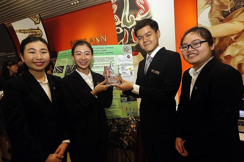 The project of Republic Polytechnic students (from left) Fennatika Salim, Lhu Ying Xuan, Ong Joo Kian and Tan Min Hui, all aged 21, was among 10 recognised with a Polytechnic Student Research Programme Award. Their sunlight-activated larvicide is 1,000 ti