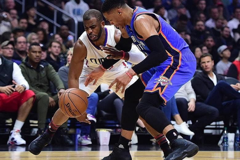 Chris Paul (left) dispossesses Russell Westbrook. The Clippers' star has 1,898 steals - more than any active NBA player.