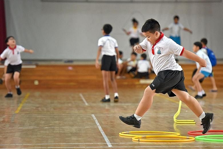 Park View Primary School pupils participating in various physical activities during recess, as part of the school's Fun And Fitness programme. Though the programme is targeted at overweight pupils, the Active Play @ Recess component is open to all an