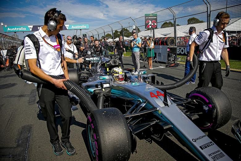 Lewis Hamilton on the starting grid in Melbourne on Sunday. Mercedes' three-time world champion was beaten at Albert Park by Ferrari's Sebastian Vettel.