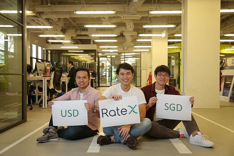 From left: Mr Lim Jing Rong, Mr Goh and Mr Gay founded RateX, which aims to "flatten" cross-border online shopping by offering real exchange rates. TravelersBox has kiosks at Changi Airport which let travellers convert their leftover foreign currency