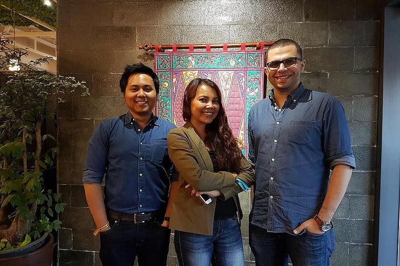 Mr Royono (left) with his Snapcart colleagues Teresa Condicion, co-founder and chief data officer, and co-founder Laith Abu Rakty, who is also chief technology officer.