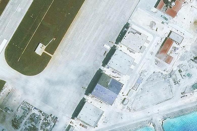 Structures seen in satellite images of (from far left) Subi Reef, Mischief Reef and Fiery Cross Reef in the Spratly Islands.