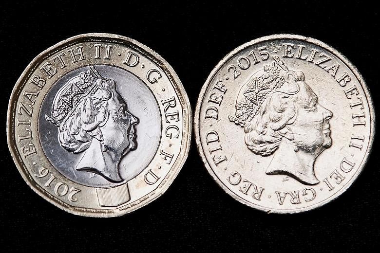 The new 12-sided £1 coin replaces the old round £1 coin, in the first change to the coin's shape since it was introduced in 1983.
