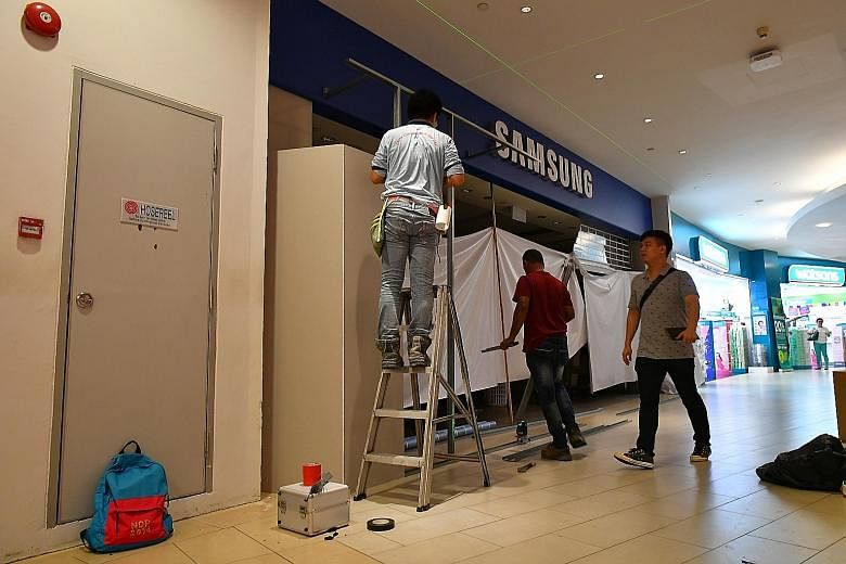 The fire at the Samsung Experience Store in basement one of AMK Hub yesterday involved contents measuring 1m by 2m in the shop's storeroom, said an SCDF spokesman.