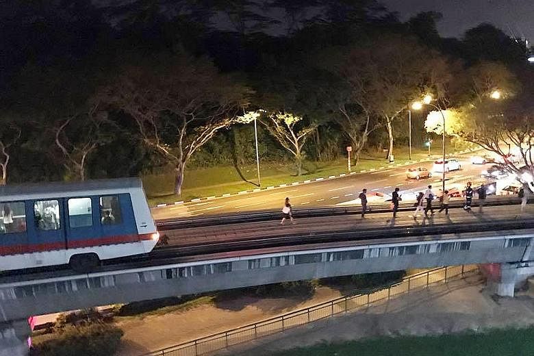 Commuters experienced an unexpected stop at around 8.30pm yesterday when part of the Bukit Panjang Light Rail Transit service was suspended for about an hour due to a train fault. Passengers were seen clambering out of a marooned train onto the track