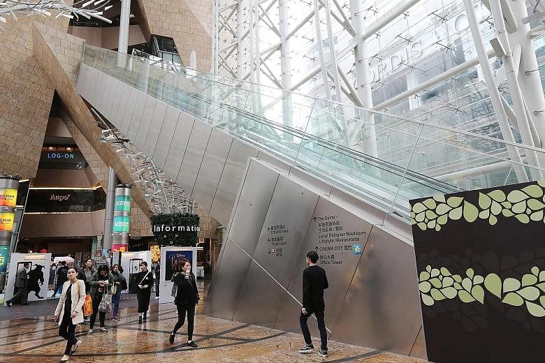 The 45m-long escalator at Langham Place suddenly reversed direction, sending dozens of people tumbling down.