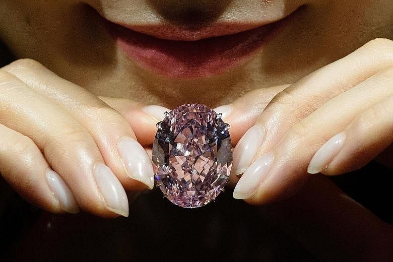 A plum-size pink diamond is expected to break the world record for a gemstone next week when it goes under the hammer in Hong Kong, Sotheby's auction house said yesterday. The 59.60-carat Pink Star is the largest in its class graded by the Gemologica