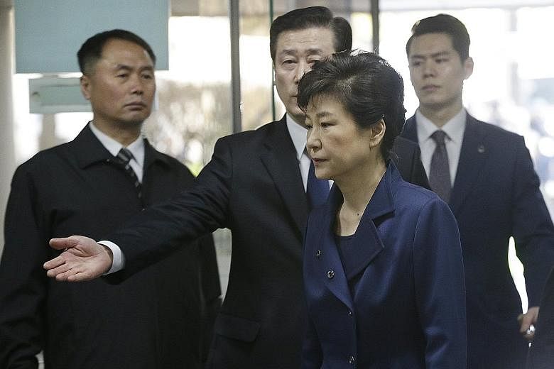 Ms Park arriving for the hearing yesterday. The prosecution says she may try to destroy evidence if she is not detained.
