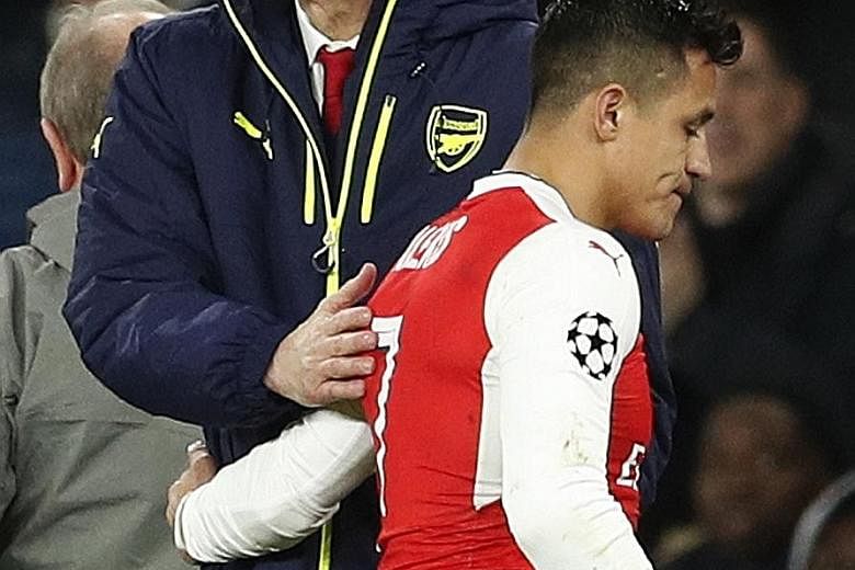Arsenal manager Arsene Wenger is more concerned with arresting the worst slump of his long career in the Premier League than making his career plans public. There are also question marks over the futures of his stars Alexis Sanchez (foreground) and M