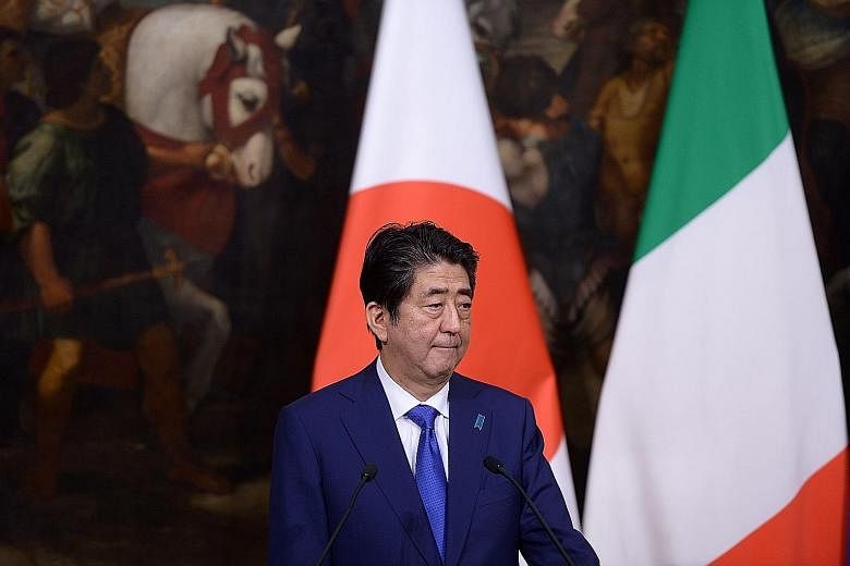 Japan's Prime Minister Shinzo Abe faces worries over reports that he donated money to a school run by ultranationalist educators in Osaka and whether China and the US - Japan's ally - will mend frayed ties.