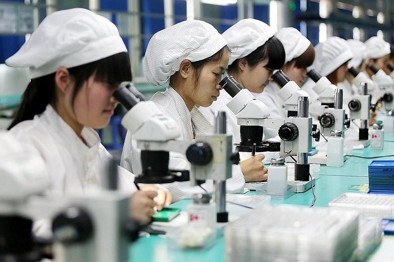 A factory in Anhui province. Latest data shows new orders in China rose to a near three-year high of 53.3 from 53. New export orders rose to 51, the highest in almost five years, and input prices fell a third month, falling to 59.3 after hitting a fi
