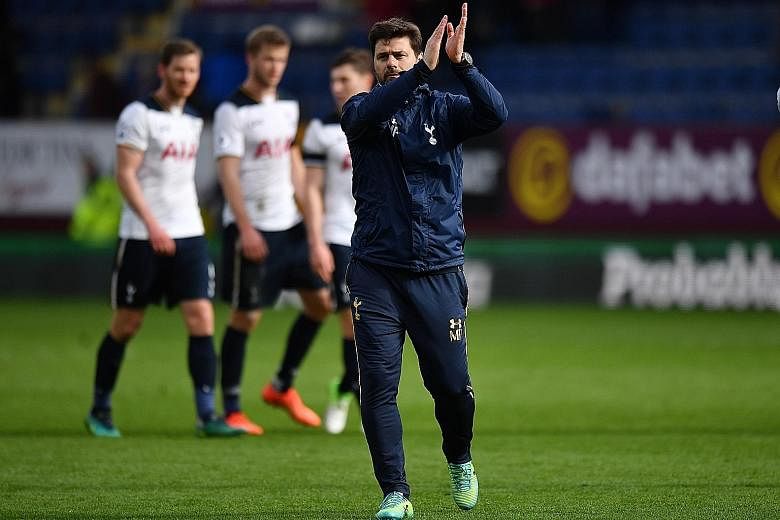 Tottenham manager Mauricio Pochettino applauds fans after his side became just the fourth team to win a league game at Turf Moor this season.