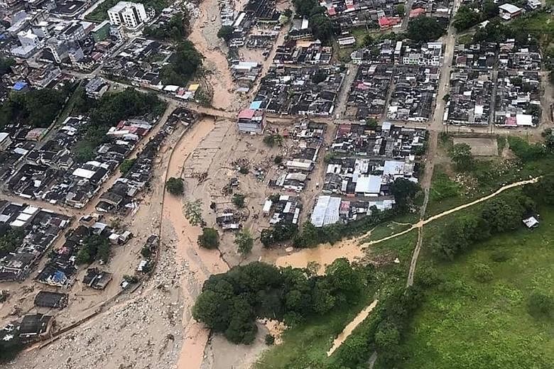 An aerial view of mudslides in Mocoa, caused by heavy rain last Friday. Colombian President Juan Manuel Santos said 30 per cent of monthly rainfall fell on Friday night, causing a rise of several rivers.