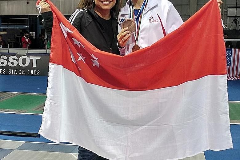 National fencer Amita Berthier celebrating her foil bronze at the World Junior and Cadet Championships in Plovdiv, Bulgaria, with her mother Uma. She trains full-time under coach Ralf Bissdorf in Boston.