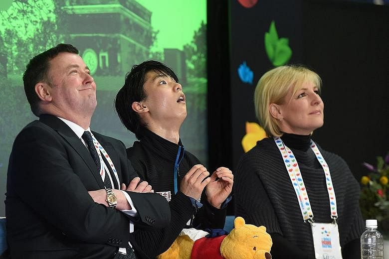 Brian Orser, a two-time Olympic silver medallist (1984 and 1988), with one of his star pupils, Japan's reigning Olympic champion, Yuzuru Hanyu, at the World Figure Skating Championships in Helsinki last weekend.