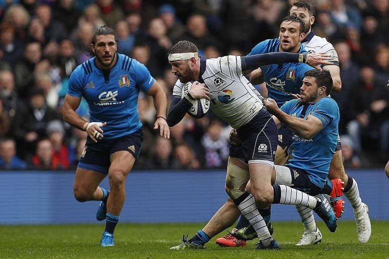 Scotland's Finn Russell being tackled by the Italian backs during their most recent clash last month at Murrayfield, which the hosts won 29-0.