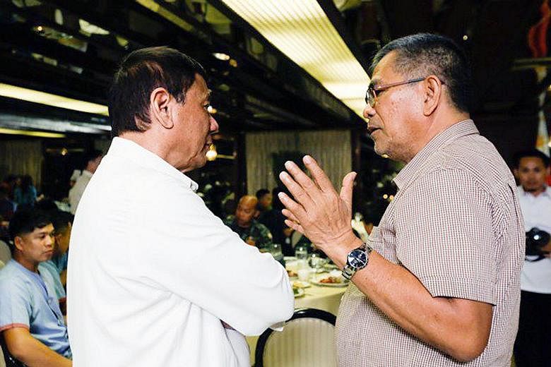 A file photo from last year showing Mr Rodrigo Duterte and Mr Ismael Sueno, who oversaw the President's anti-narcotics drive that has left over 7,000 suspects dead.