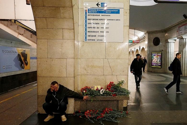 Bombing suspect Akbarzhon Jalilov was born in Osh in 1995. A memorial for victims at Technology Institute metro station in St Petersburg. Monday's explosion took place in the carriage of a train that had been travelling between that station and Senna