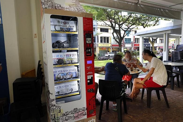SPH's newspaper vending machine at Block 51, Havelock Road, is one of the first three machines to be launched. There will be a series of contests to celebrate the launch of the new machines.